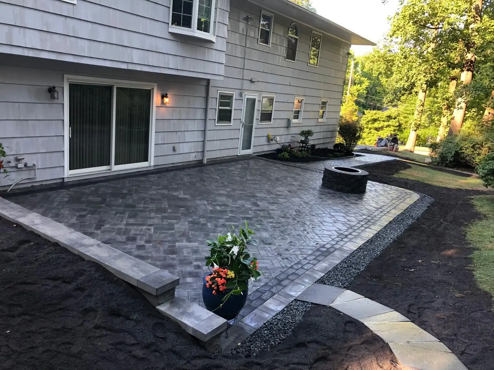 Commercial masonry Garfield NJ - deck with glass railing and modern design